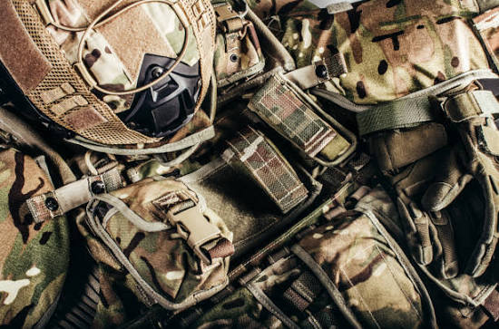 Close detail of tactical webbing and helmet